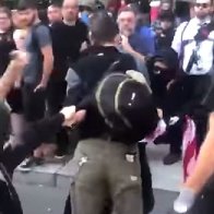 Bernie Sanders supporter protesting right-wing rally with American flag beaten up by Antifa, video shows