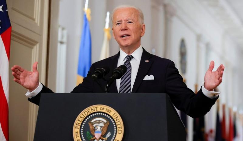 Biden signs massive covid bill and makes a prediction