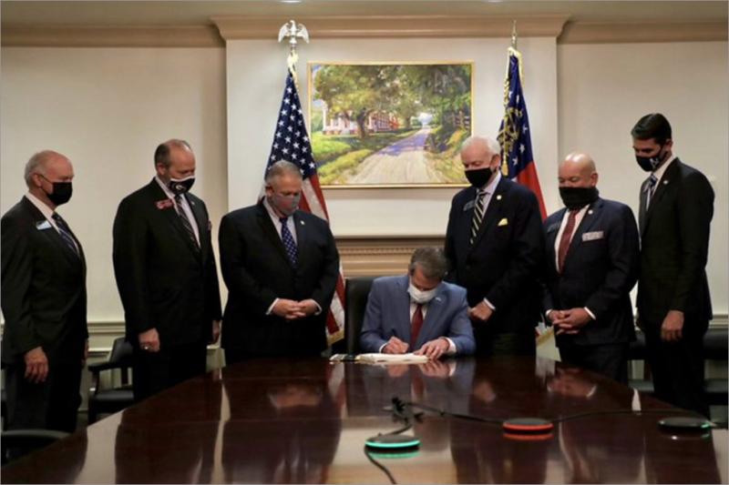 Georgia’s Voter Suppression Bill Signed Into Law While Slave Plantation Painting Hangs In Background