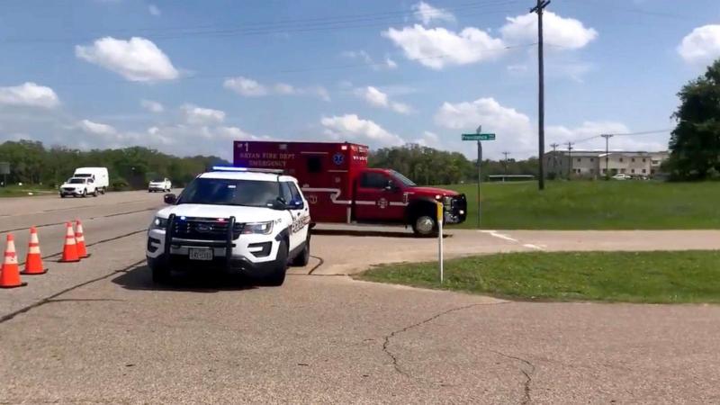 1 dead, 4 critically injured in office shooting; possible suspect in custody