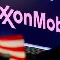 Exxon loses board seats to activist hedge fund in landmark climate vote