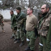 Ukrainian officials parade captured Russian soldiers, videos show