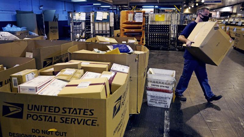 Congress passes bill to shore up Postal Service without cutting back on delivery : NPR