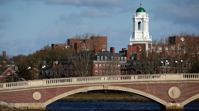 Harvard says it will issue reparations after report details its ties to slavery 
