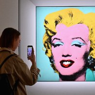 Warhol’s Marilyn portrait sells for world record $195m