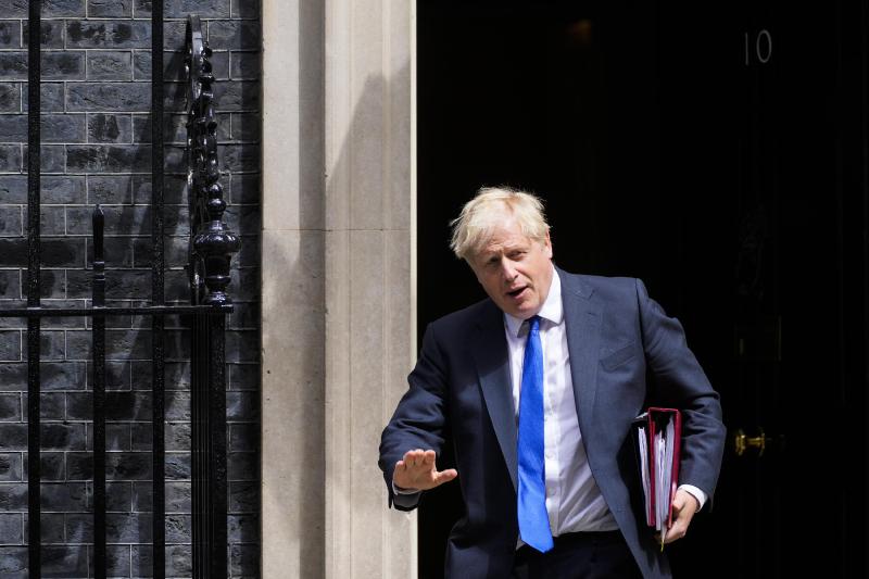 UK's Johnson defiant even as opponents tell him time is up | AP News