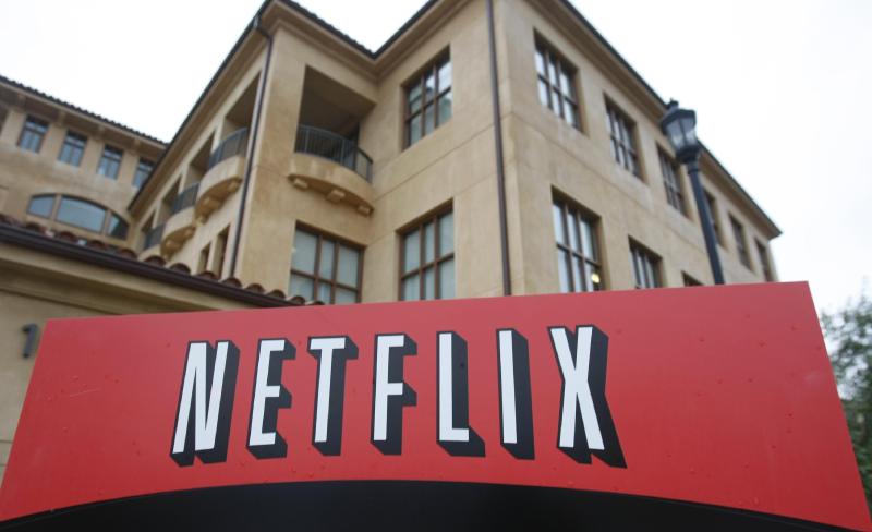 Netflix to rely on Microsoft for its ad-backed video service | AP News