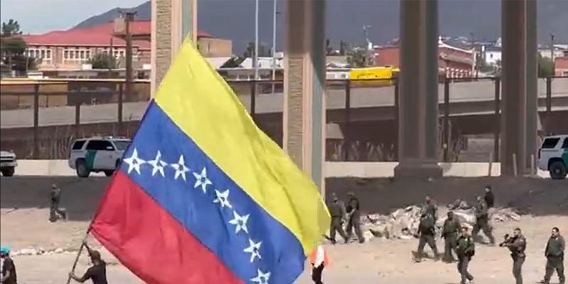 Illegal migrants wave Venezuelan flag after crossing US southern border, attack Border Patrol agents