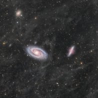 Daily Telescope: Two large galaxies swimming in a sea of interstellar dust | Ars Technica