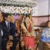 Wishing  the newly married couple a happy conjugal life