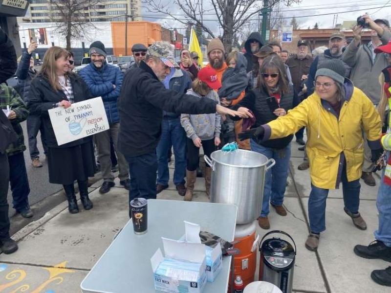 Right-wing Idaho activists burn masks, claiming COVID restrictions infringe on liberties