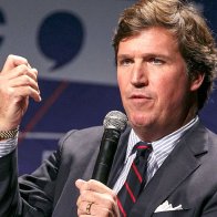 Tucker Carlson slams ex-Fox staffer who said he should be in jail for promoting 'replacement theory'