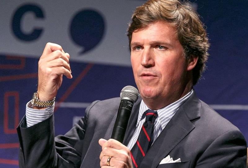 Tucker Carlson slams ex-Fox staffer who said he should be in jail for promoting 'replacement theory'