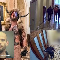 Jan. 6 footage shows cops bringing QAnon Shaman to Senate floor