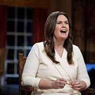 Sarah Huckabee Sanders Accused of Hypocrisy Over Request for Federal Aid