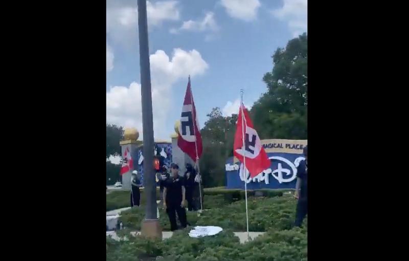 Nazi protestors wave swastika & Ron DeSantis flags outside Disney World - LGBTQ Nation