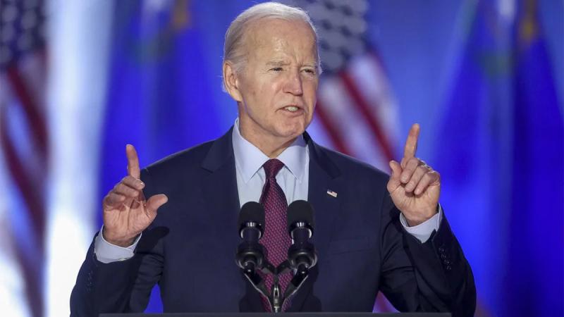 Biden tells crowd he recently met with Mitterrand, former French president who died in 1996