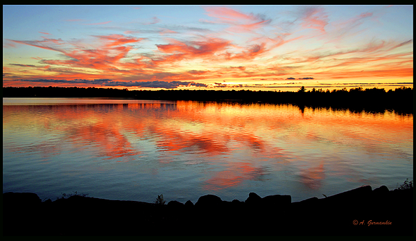 poconomountainpennsylvaniasunsetoveralakeagurmankin.jpg