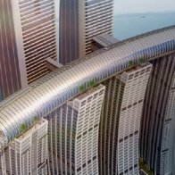 It's a 'horizontal skyscraper'! Chinese workers are building an enormous glass corridor ABOVE four 60-storey towers