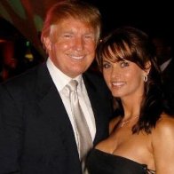 Former Playboy model says Trump tried to pay her after sex