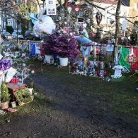 George Michael's family ask fans to remove tributes from outside his house - out of respect for his neighbors