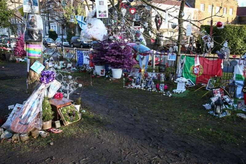 George Michael's family ask fans to remove tributes from outside his house - out of respect for his neighbors