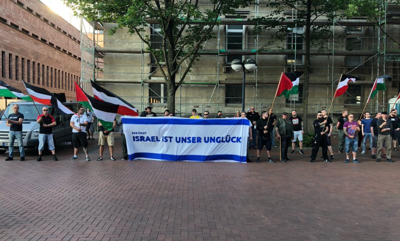 NEO-NAZIS WAVE PALESTINIAN FLAGS IN PROTEST AGAINST ISRAEL