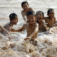 The Simple Joys Of Playing In Water