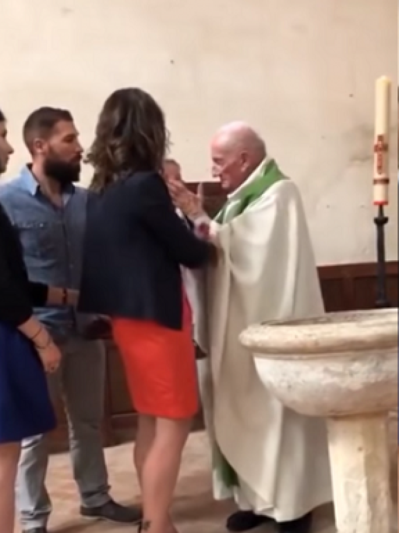 Priest Who Slapped Crying Baby in Face to 'Calm Him Down' During Baptism Retires