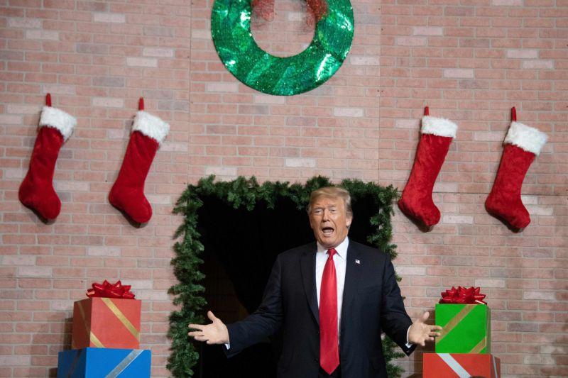  Trump Emerges From A Big Fake Christmas Fireplace, And The Jokes Write Themselves