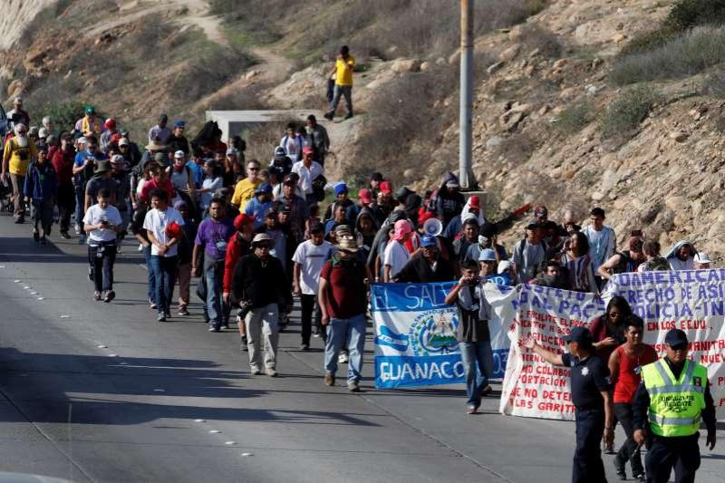 Migrant group demands Trump either let them in or pay them each $50G to turn around: report 