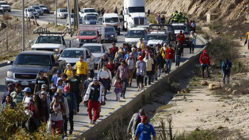 Migrant group demands Trump either let them in or pay them each $50G to turn around: report