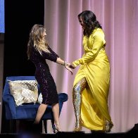 Michelle Obama wears $4K thigh-high Balenciaga glitter boots on book tour