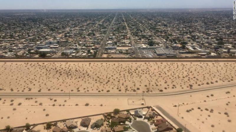 Hundreds of migrants cross Arizona border after 'several busloads' dropped off in Mexico