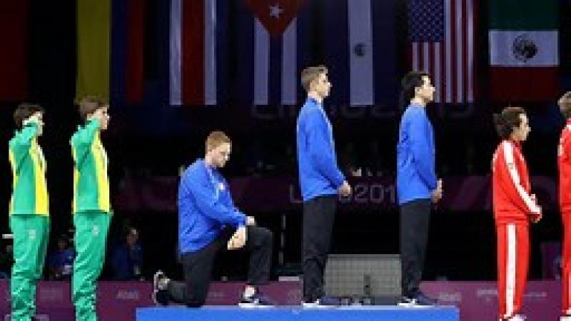 I’m proud to be an American fencing champion. Here’s why I knelt for our anthem.
