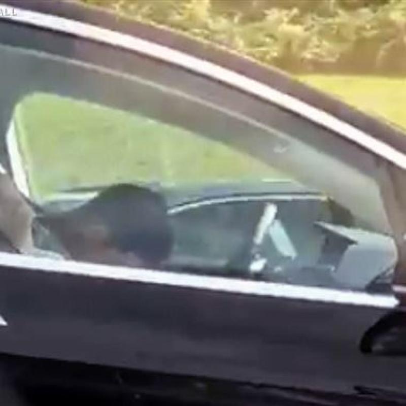 Video shows motorist asleep behind wheel of self-driving Tesla
