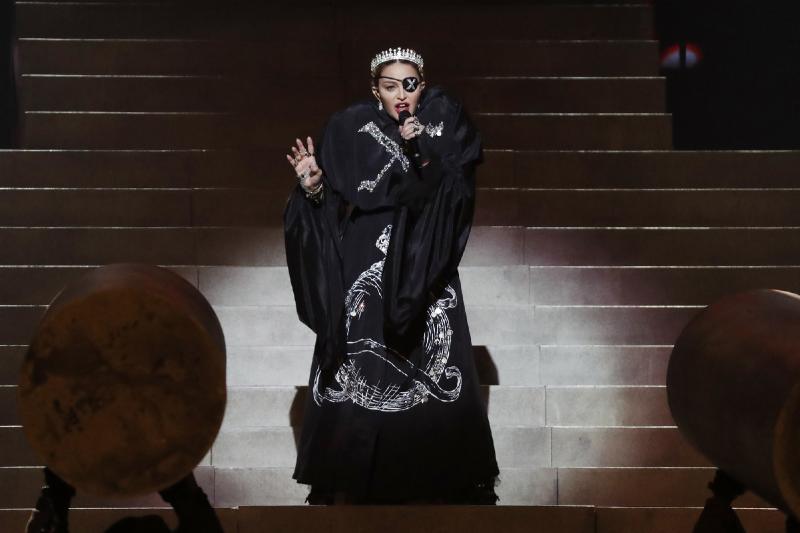 Madonna is frequently hours late for concerts, a fan says. He's suing.