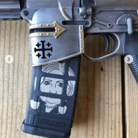 Don Jr posted photos of himself brandishing a modified assault rifle with CRUSADER etched on it -  Crusader imagery on weapons & propaganda has been used by Far-Right terrorists since Brevik