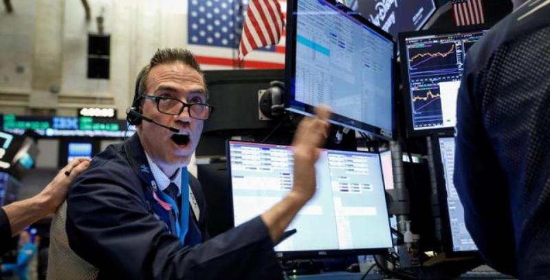 Wall Street tumbles after Fed surprise rate cut