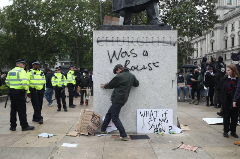 Britons divided over graffiti branding Churchill a racist