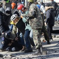 Trump campaign image of cop being attacked is actually of 2014 Ukraine 