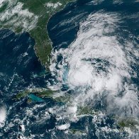 Florida battens down for Tropical Storm Isaias, which will move up U.S. East Coast