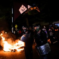 Police arrest 15 more after overnight protests in Portland