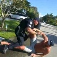 Body camera footage shows Trump's former campaign manager Brad Parscale being tackled by police outside his Florida home