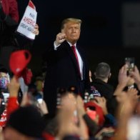 Trump tells Pennsylvania rally 'nobody wants me' before cutting event short and dancing off stage to YMCA