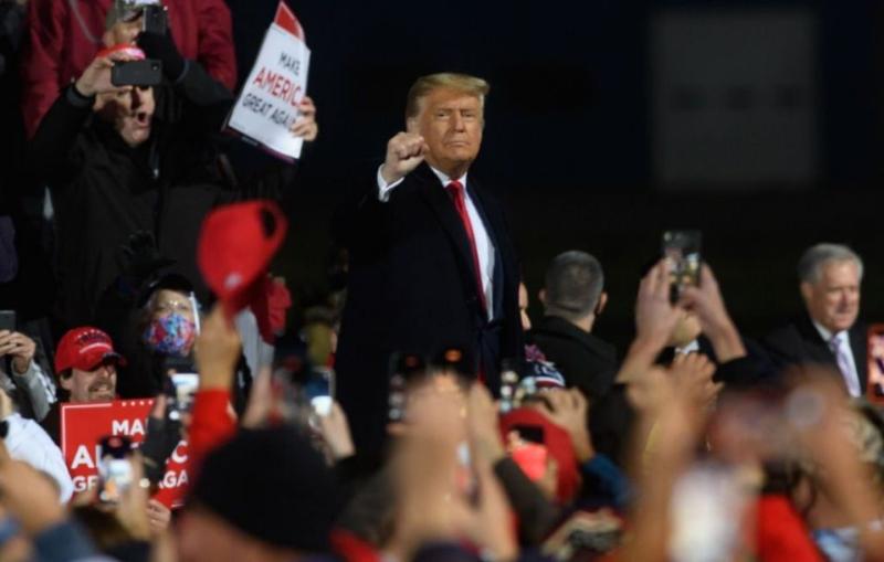 Trump tells Pennsylvania rally 'nobody wants me' before cutting event short and dancing off stage to YMCA