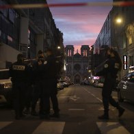 3 dead in church attack, plunging France into dual emergency