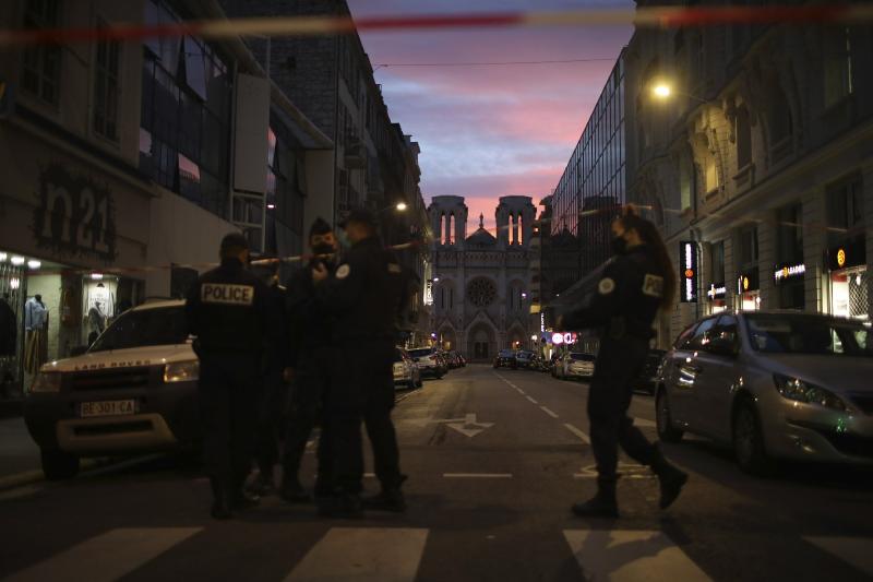 3 dead in church attack, plunging France into dual emergency