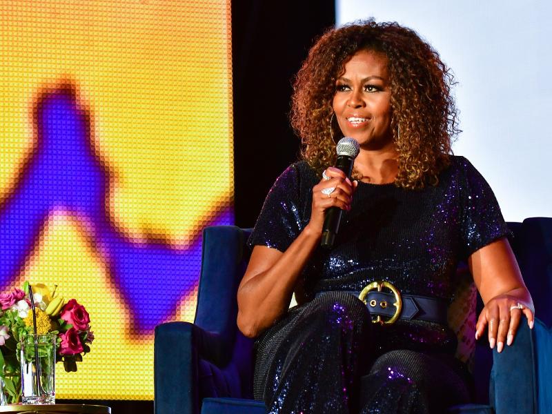 This isn't a game': Michelle Obama rips into Trump for refusing to concede and says he put her family in danger with 'racist lies