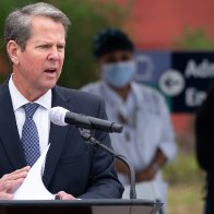 Republican Georgia Gov. Kemp says pro-Trump conspiracy theorists have threatened his family